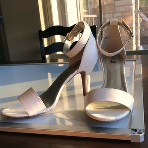 White “A.N.A” heels.